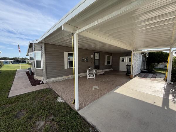 Winter Haven, FL Mobile Home for Sale located at 215 Fairway Circle Swiss Golf & Tennis